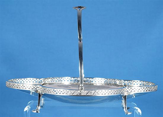 A George V Arts & Crafts silver shallow basket, by Albert Edward Jones, width 277mm, weight 13oz/405grms.